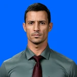 AI Career Coach Jairo Knox, trained using Jocko Willink Extreme Ownership model, is pictured in a professional head and shoulders photo. He wears a dark green button-down shirt and a dark tie. His expression is serious and haircut short and tight.